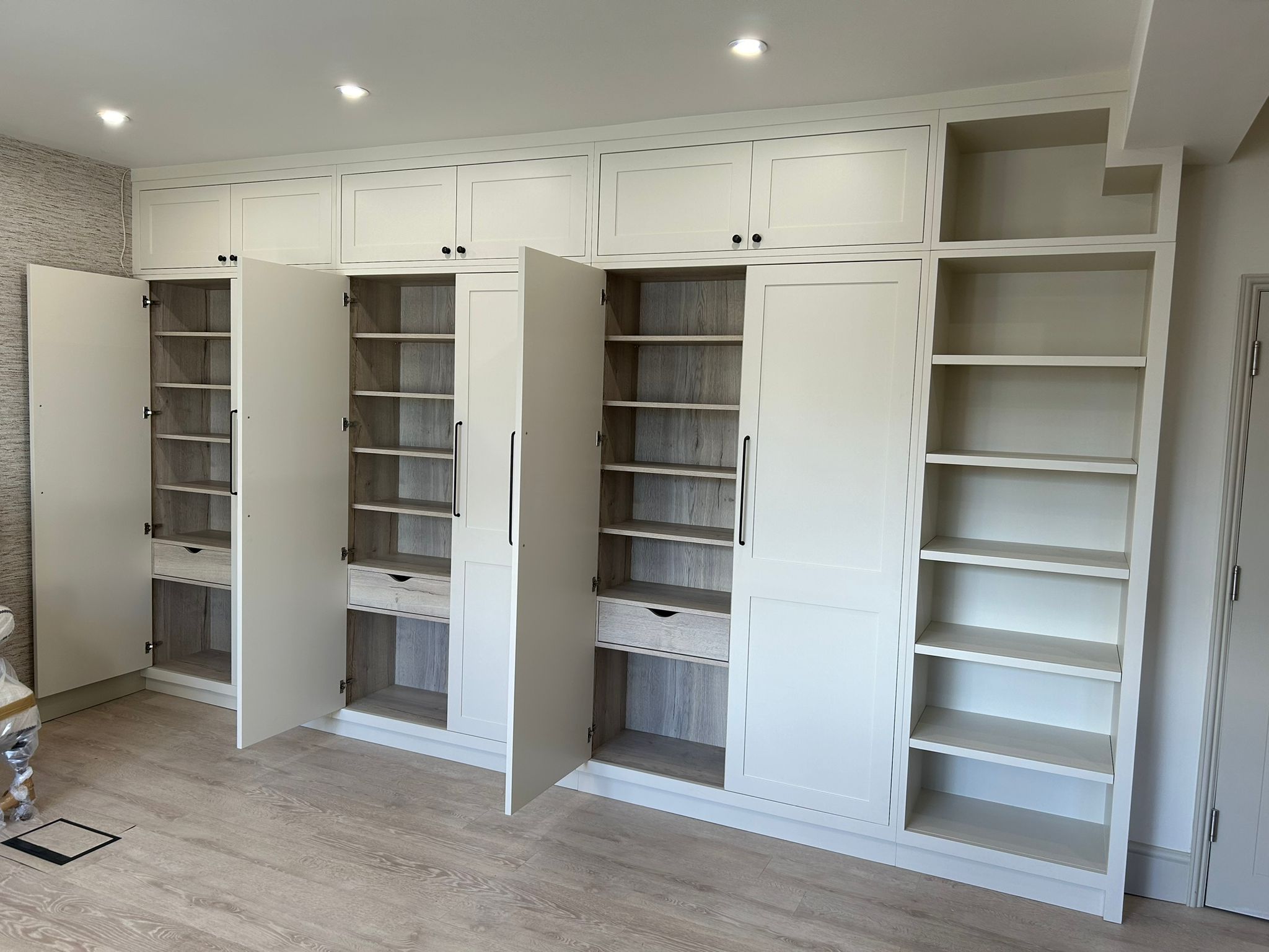 Custom Cabinetry with built in shelving and drawers